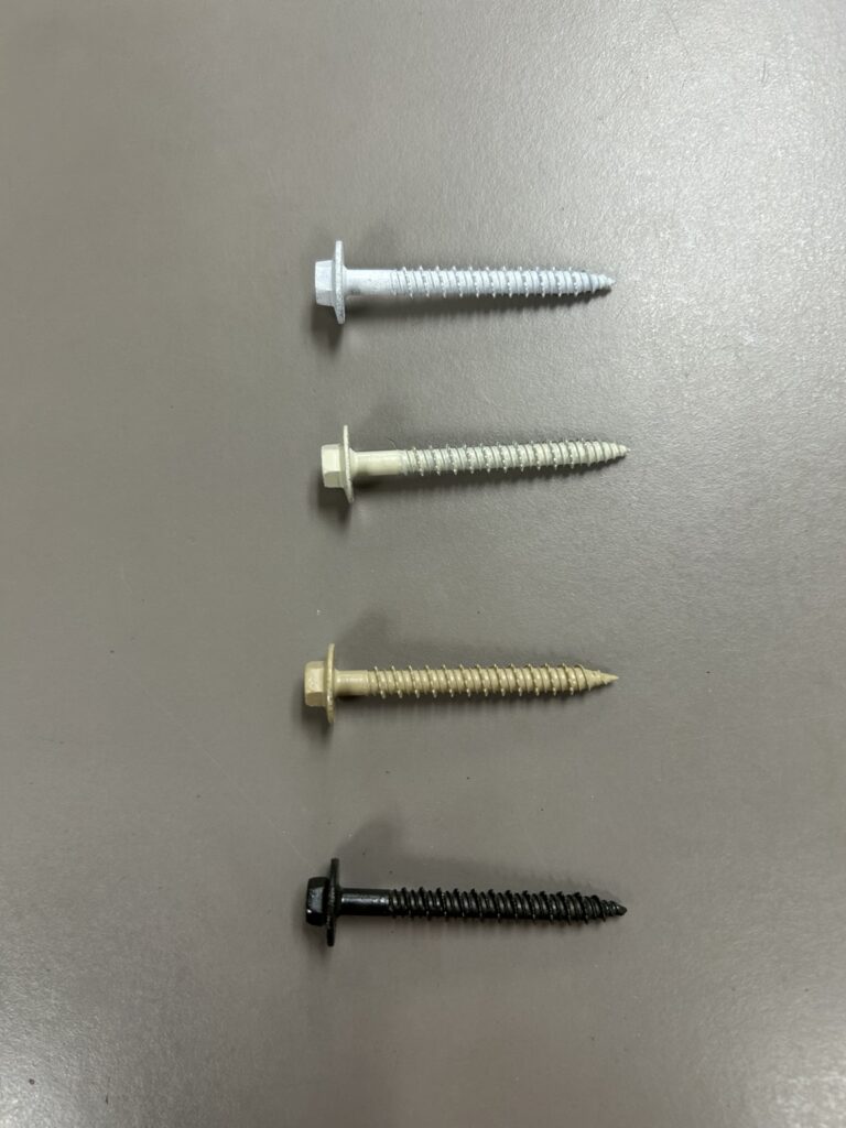 White, ivory, tan and black color-matched hex-head fasteners for storm-panel mounting